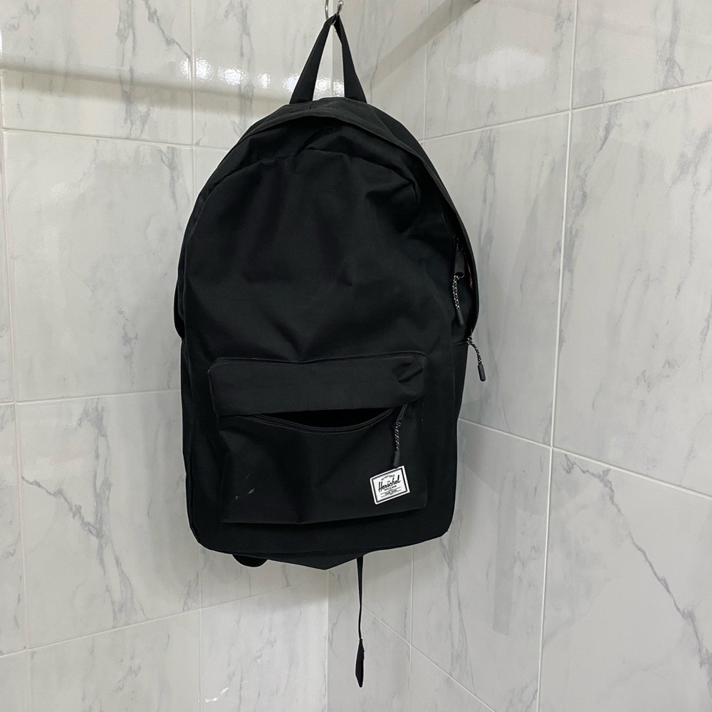 Black Herschel backpack.